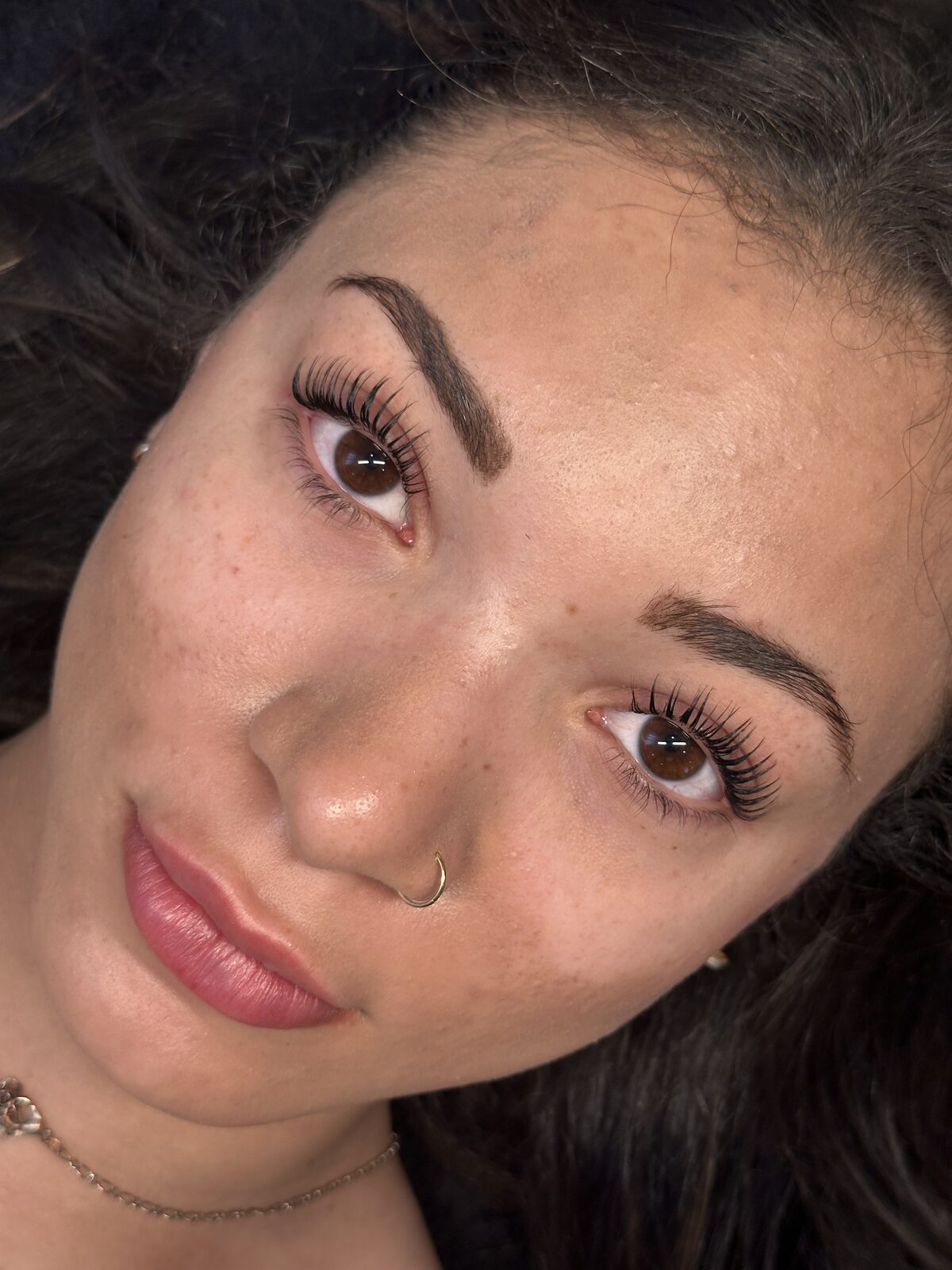 Wispy lash extension set on a client in Greater Sudbury